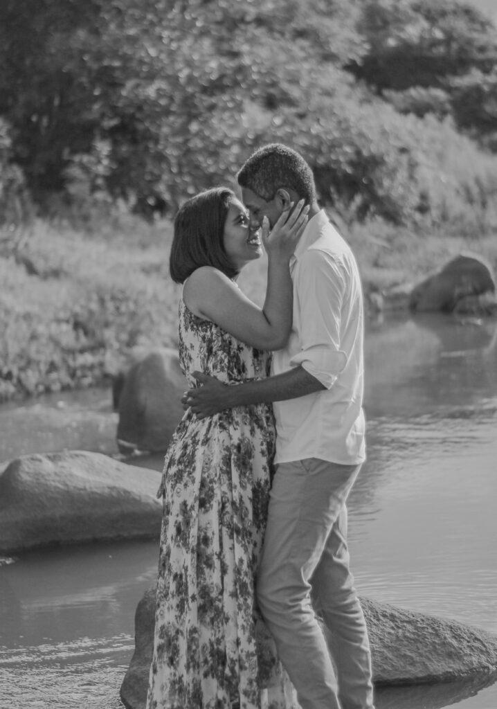pexels photo 29258020 29258020 A couple sharing a loving embrace by a serene riverside in a natural setting.